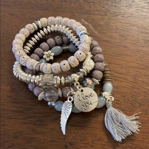 A stack of 4 bracelet new, from my boutique.